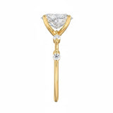 Oval cut Moissanite lab grown diamond engagement ring with tube set small round moissanites on the shank, on a gold band, against a white background.Moissanite engagement ring cape town south africa grand diamonds ralph jacobs jeulia 