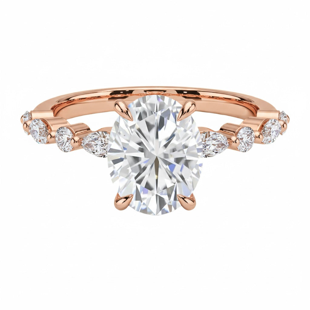 Oval cut Moissanite lab grown diamond engagement ring with tube set small round moissanites on the shank, on a gold band, against a white background.Moissanite engagement ring cape town south africa grand diamonds ralph jacobs jeulia 