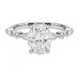 Oval cut Moissanite lab grown diamond engagement ring with tube set small round moissanites on the shank, on a gold band, against a white background.Moissanite engagement ring cape town south africa grand diamonds ralph jacobs jeulia 