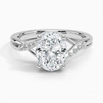 Oval cut Moissanite lab grown diamond engagement ring twisted v shank set with shared prong stones on a gold shank, against a white background.Moissanite engagement ring cape town south africa grand diamonds ralph jacobs jeulia 