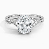 Oval cut Moissanite lab grown diamond engagement ring twisted v shank set with shared prong stones on a gold shank, against a white background.Moissanite engagement ring cape town south africa grand diamonds ralph jacobs jeulia 