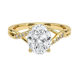 Oval cut Moissanite lab grown diamond engagement ring twisted v shank set with shared prong stones on a gold shank, against a white background.Moissanite engagement ring cape town south africa grand diamonds ralph jacobs jeulia 