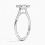 Oval shape Moissanite lab grown diamond engagement ring round shank with a bezel setting, on a gold band, against a white background.Moissanite engagement ring cape town south africa grand diamonds ralph jacobs jeulia 