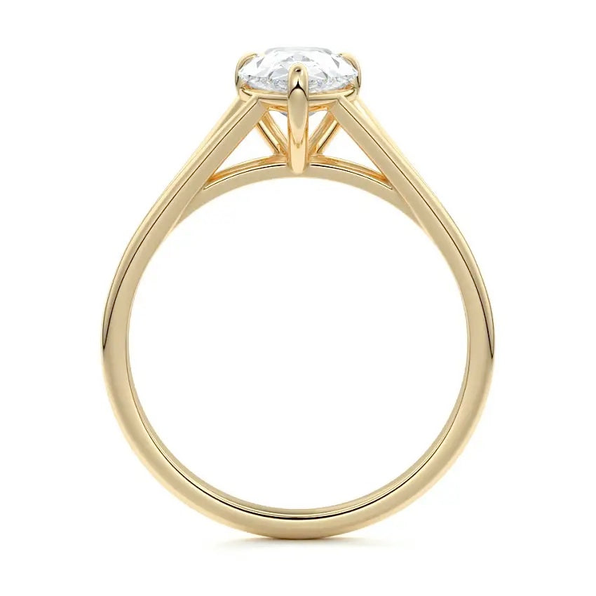 Pear cut Moissanite lab grown diamond engagement ring v-split band with a three claw cathedral setting, on a gold band, against a white background.Moissanite engagement ring cape town south africa grand diamonds ralph jacobs jeulia