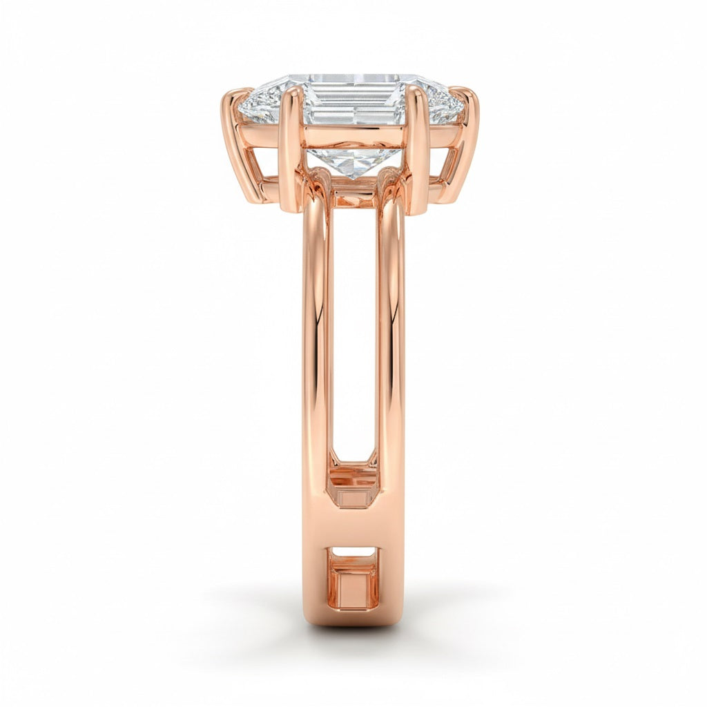 Pear cut Moissanite lab grown diamond engagement ring double band with a six claw setting, on a gold band, against a white background.Moissanite engagement ring cape town south africa grand diamonds ralph jacobs jeulia  