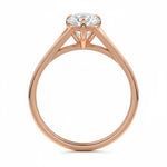 Pear cut Moissanite lab grown diamond engagement ring v-split band with a three claw cathedral setting, on a gold band, against a white background.Moissanite engagement ring cape town south africa grand diamonds ralph jacobs jeulia