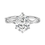 Pear cut Moissanite lab grown diamond engagement ring twisted shank with a six claw setting, on a gold band, against a white background.Moissanite engagement ring cape town south africa grand diamonds ralph jacobs jeulia  