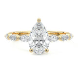 Pear cut Moissanite lab grown diamond engagement ring half eternity fancy set shank with classic three prong setting, on a gold band, against a white background.Moissanite engagement ring cape town south africa grand diamonds ralph jacobs jeulia 