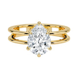 Pear cut Moissanite lab grown diamond engagement ring double band with a six claw setting, on a gold band, against a white background.Moissanite engagement ring cape town south africa grand diamonds ralph jacobs jeulia  
