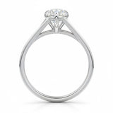 Pear cut Moissanite lab grown diamond engagement ring v-split band with a three claw cathedral setting, on a gold band, against a white background.Moissanite engagement ring cape town south africa grand diamonds ralph jacobs jeulia