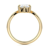 Pear cut Moissanite lab grown diamond engagement ring v-split band with a three claw cathedral setting, on a gold band, against a white background.Moissanite engagement ring cape town south africa grand diamonds ralph jacobs jeulia  