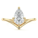 Engagement ring Pear cut Moissanite lab grown diamond engagement ring v-shaped band with a suspended four claw setting, on a gold band, against a white background.Moissanite engagement ring cape town south africa grand diamonds ralph jacobs jeulia  