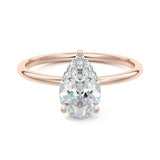 Engagement ring with pear cut moissanite or lab grown diamond solitaire three cat claw hidden halo in yellow rose or white gold hidden double halo and pave set shank Cape Town South Africa grand diamonds ralph jacobs jeuli