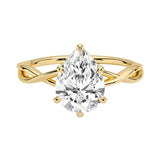 Pear cut Moissanite lab grown diamond engagement ring twisted shank with a six claw setting, on a gold band, against a white background.Moissanite engagement ring cape town south africa grand diamonds ralph jacobs jeulia  