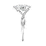 Pear cut Moissanite lab grown diamond engagement ring twisted shank with a six claw setting, on a gold band, against a white background.Moissanite engagement ring cape town south africa grand diamonds ralph jacobs jeulia  