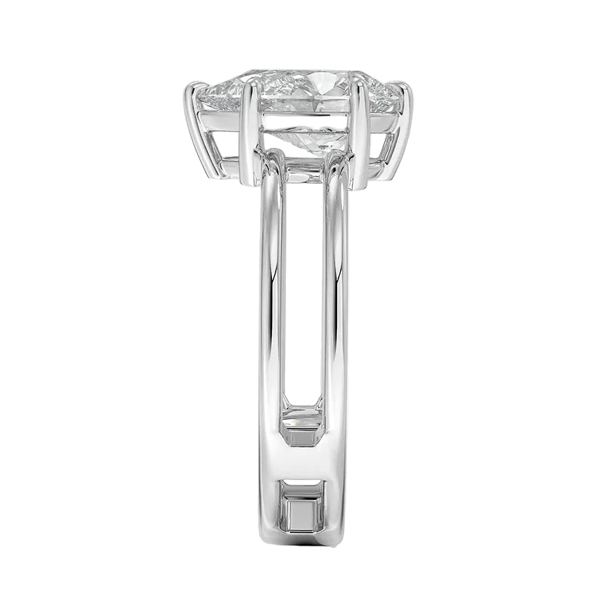 Pear cut Moissanite lab grown diamond engagement ring double band with a six claw setting, on a gold band, against a white background.Moissanite engagement ring cape town south africa grand diamonds ralph jacobs jeulia  