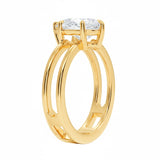 Pear cut Moissanite lab grown diamond engagement ring double band with a six claw setting, on a gold band, against a white background.Moissanite engagement ring cape town south africa grand diamonds ralph jacobs jeulia  