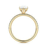 Pear cut Moissanite lab grown diamond engagement ring half eternity set shank with classic three prong setting, on a gold band, against a white background.Moissanite engagement ring cape town south africa grand diamonds ralph jacobs jeulia 