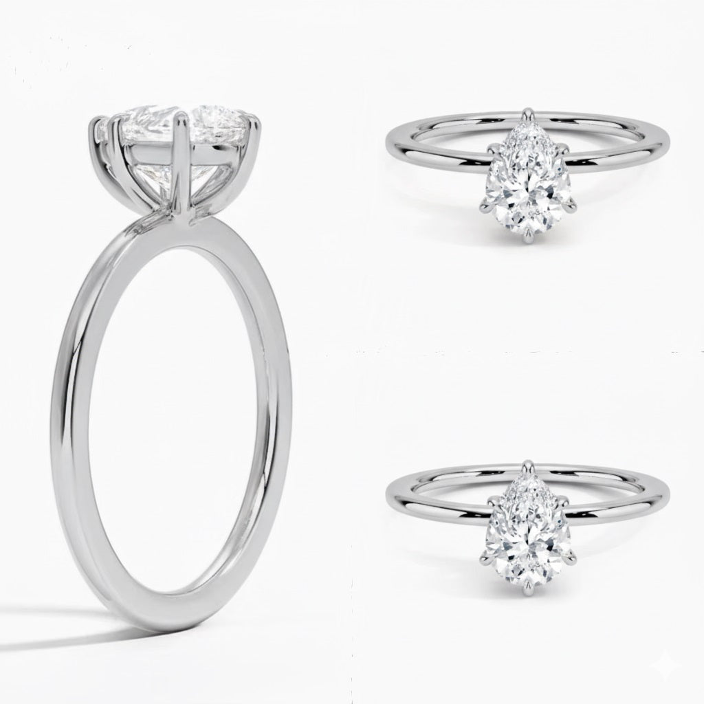 Pear cut Moissanite lab grown diamond engagement ring round shank with a six claw setting, on a gold band, against a white background.Moissanite engagement ring cape town south africa grand diamonds ralph jacobs jeuli