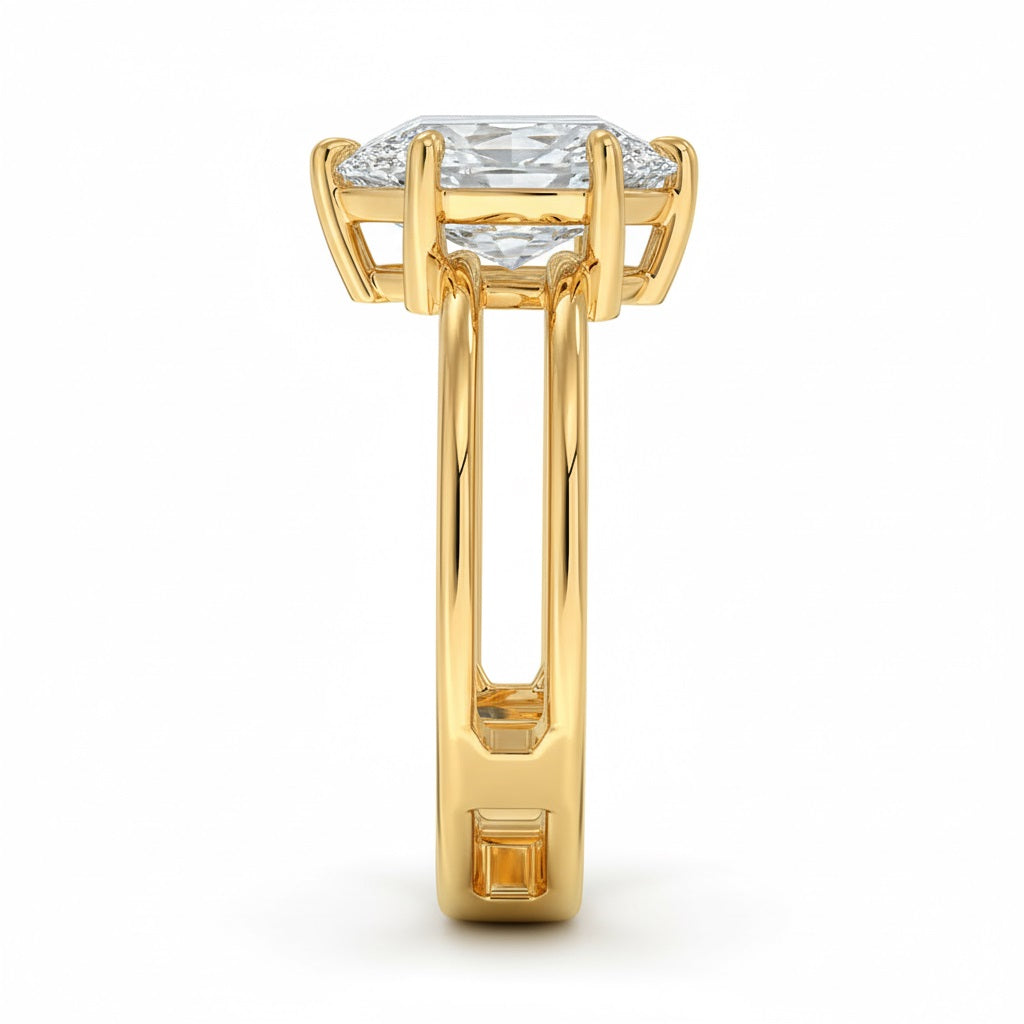 Pear cut Moissanite lab grown diamond engagement ring double band with a six claw setting, on a gold band, against a white background.Moissanite engagement ring cape town south africa grand diamonds ralph jacobs jeulia  