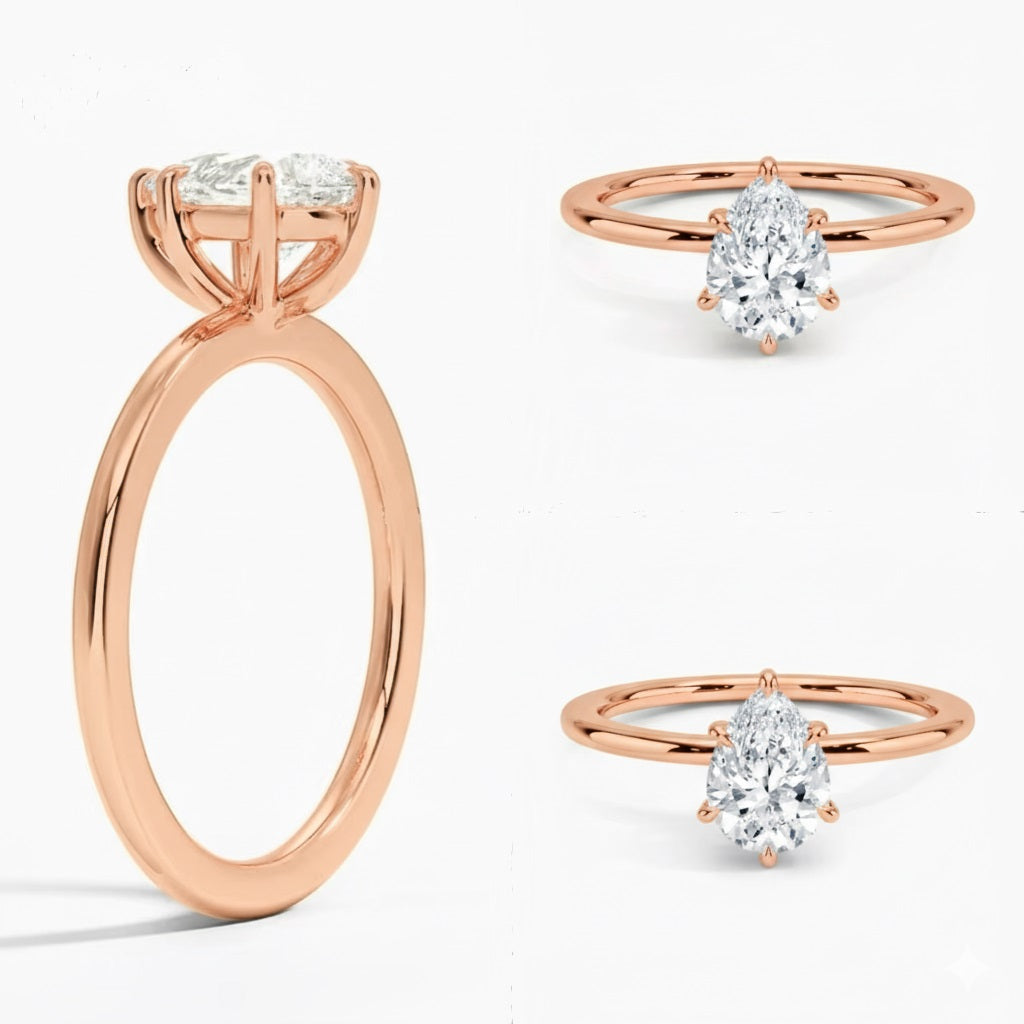 Pear cut Moissanite lab grown diamond engagement ring round shank with a six claw setting, on a gold band, against a white background.Moissanite engagement ring cape town south africa grand diamonds ralph jacobs jeuli