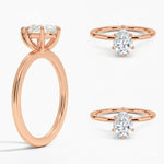 Pear cut Moissanite lab grown diamond engagement ring round shank with a six claw setting, on a gold band, against a white background.Moissanite engagement ring cape town south africa grand diamonds ralph jacobs jeuli