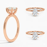 Pear cut Moissanite lab grown diamond engagement ring round shank with a six claw setting, on a gold band, against a white background.Moissanite engagement ring cape town south africa grand diamonds ralph jacobs jeuli