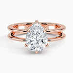 Pear cut Moissanite lab grown diamond engagement ring double band with a six claw setting, on a gold band, against a white background.Moissanite engagement ring cape town south africa grand diamonds ralph jacobs jeulia  