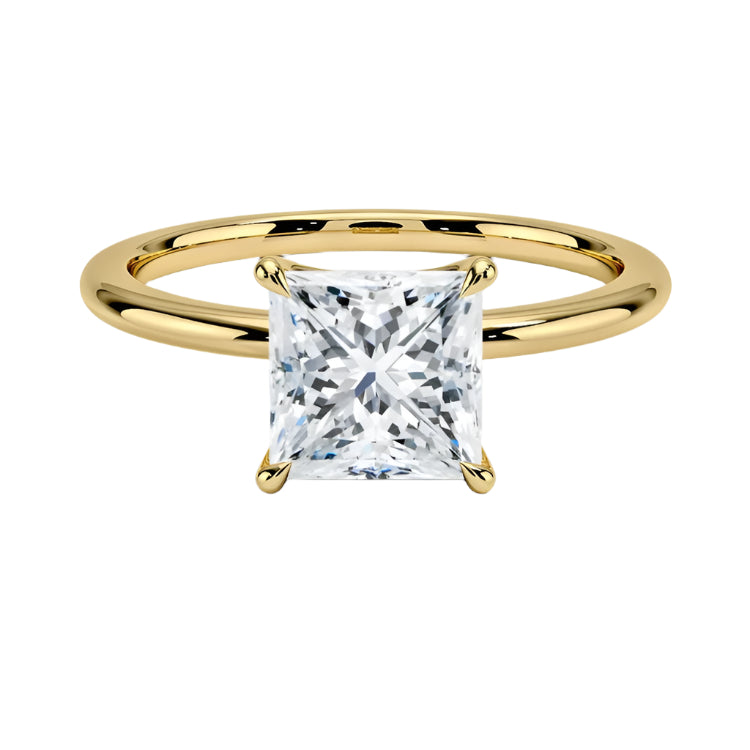Princess cut Moissanite lab grown diamond engagement ring round shank with a four claw setting, on a gold band, against a white background.Moissanite engagement ring cape town south africa grand diamonds ralph jacobs jeulia 