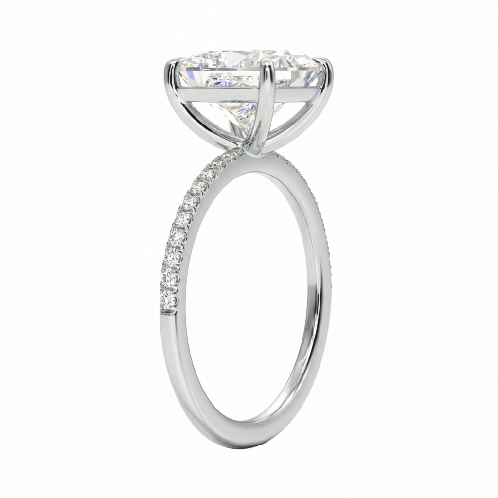 Princess cut Moissanite lab grown diamond engagement ring with classic pave set gold band, against a white background.Moissanite engagement ring cape town south africa grand diamonds ralph jacobs jeulia 