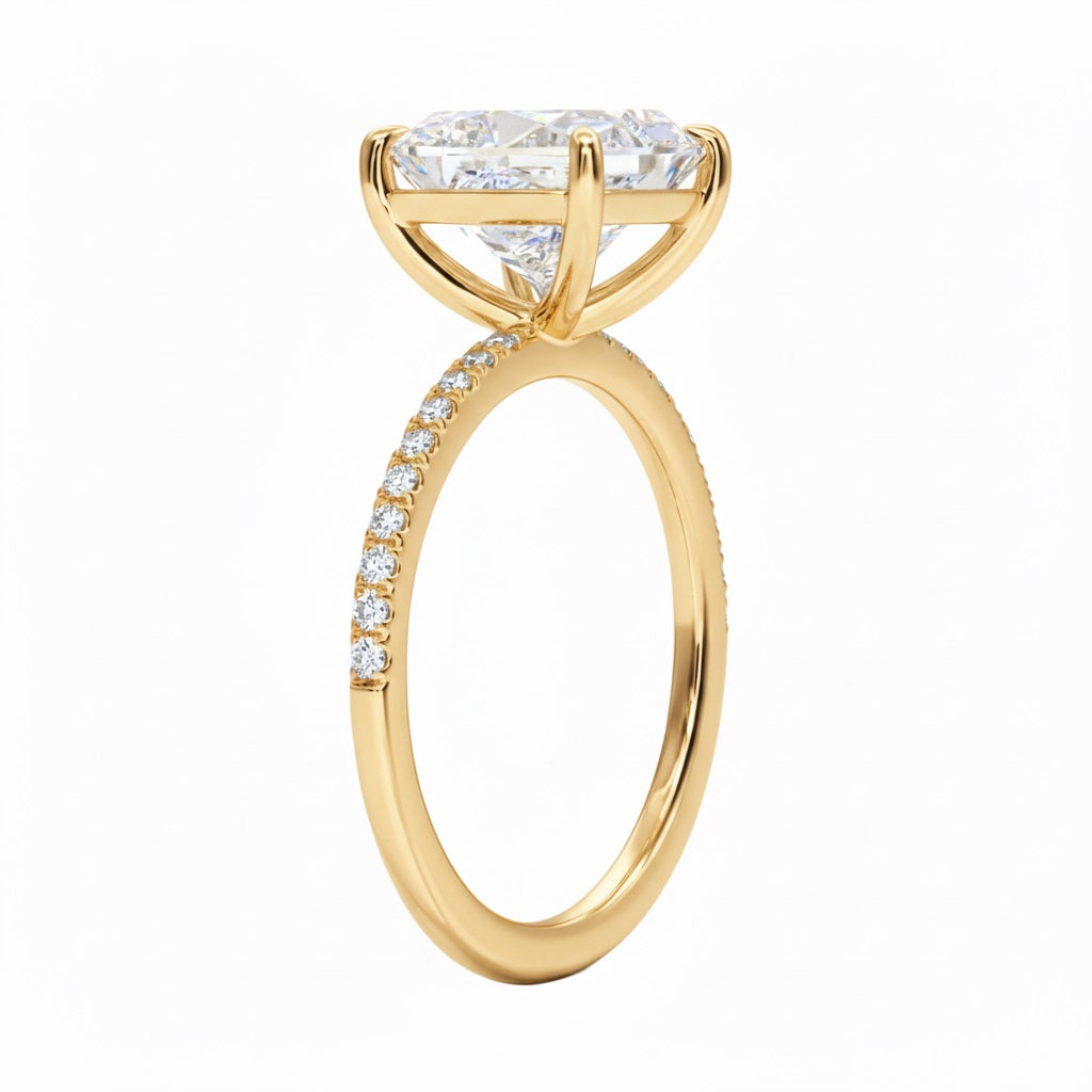 Princess cut Moissanite lab grown diamond engagement ring with classic pave set gold band, against a white background.Moissanite engagement ring cape town south africa grand diamonds ralph jacobs jeulia 