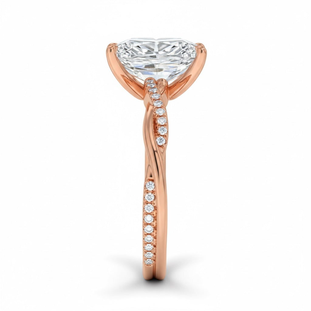 Radiant cut Moissanite lab grown diamond engagement ring with twisted pave set gold shank, against a white background.Moissanite engagement ring cape town south africa grand diamonds ralph jacobs jeulia 