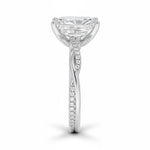 Radiant cut Moissanite lab grown diamond engagement ring with twisted pave set gold shank, against a white background.Moissanite engagement ring cape town south africa grand diamonds ralph jacobs jeulia 