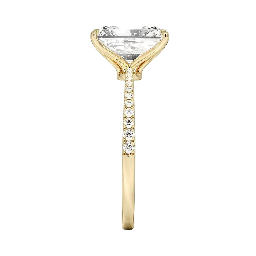 Radiant cut Moissanite lab grown diamond engagement ring pave set shank with classic four prong setting, on a gold band, against a white background.Moissanite engagement ring cape town south africa grand diamonds ralph jacobs jeulia 