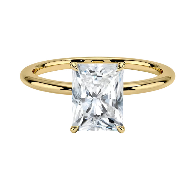 Radiant cut Moissanite lab grown diamond engagement ring round shank with a four claw setting, on a gold band, against a white background.Moissanite engagement ring cape town south africa grand diamonds ralph jacobs jeuli