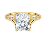 Engagement ring Radiant cut Moissanite lab grown diamond engagement ring v-Split round shank with a four cat-claw setting, on a gold band, against a white background.Moissanite engagement ring cape town south africa grand diamonds ralph jacobs jeulia 