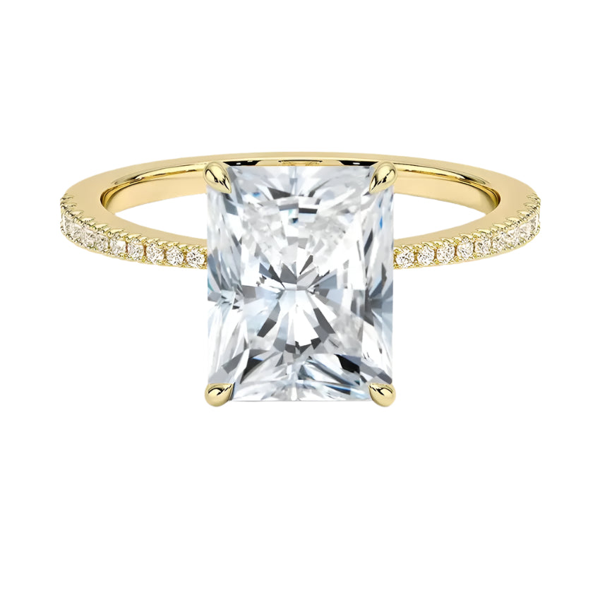 Radiant cut Moissanite lab grown diamond engagement ring pave set shank with classic four prong setting, on a gold band, against a white background.Moissanite engagement ring cape town south africa grand diamonds ralph jacobs jeulia 