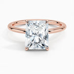 Radiant cut Moissanite lab grown diamond engagement ring round shank with a four claw setting, on a gold band, against a white background.Moissanite engagement ring cape town south africa grand diamonds ralph jacobs jeuli