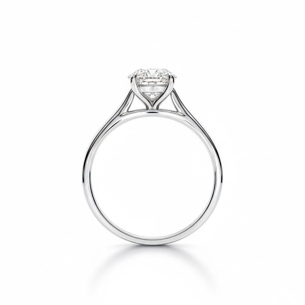 Engagement ring Cathedral setting round cut Moissanite lab grown diamond engagement ring round shank with a four claw setting, on a gold band, against a white background.Moissanite engagement ring cape town south africa grand diamonds ralph jacobs jeulia 