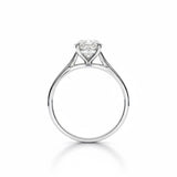 Engagement ring Cathedral setting round cut Moissanite lab grown diamond engagement ring round shank with a four claw setting, on a gold band, against a white background.Moissanite engagement ring cape town south africa grand diamonds ralph jacobs jeulia 