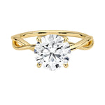 Round cut Moissanite lab grown diamond engagement ring twisted  band with a four claw setting, on a gold band, against a white background.Moissanite engagement ring cape town south africa grand diamonds ralph jacobs jeulia  