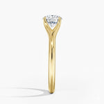 Round cut Split Shank Moissanite lab grown diamond engagement ring round shank with a six claw setting, on a gold band, against a white background.Moissanite engagement ring cape town south africa grand diamonds ralph jacobs jeuli