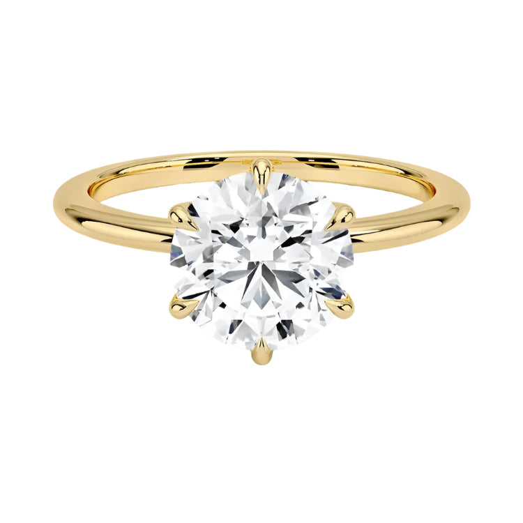 Round cut Moissanite lab grown diamond engagement ring round band with a six claw setting, on a gold band, against a white background.Moissanite engagement ring cape town south africa grand diamonds ralph jacobs jeulia  