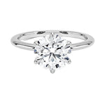 Round cut Moissanite lab grown diamond engagement ring round band with a six claw setting, on a gold band, against a white background.Moissanite engagement ring cape town south africa grand diamonds ralph jacobs jeulia  