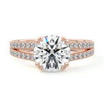 Round cut Cathedral Double claw set Moissanite lab grown diamond engagement ring with pave set V_split shank on a gold band, against a white background.Moissanite engagement ring cape town south africa grand diamonds ralph jacobs jeulia 