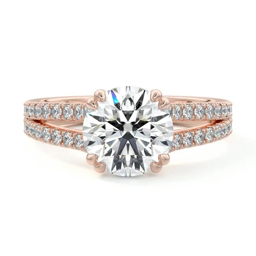 Round cut Cathedral Double claw set Moissanite lab grown diamond engagement ring with pave set V_split shank on a gold band, against a white background.Moissanite engagement ring cape town south africa grand diamonds ralph jacobs jeulia 