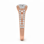 Round cut Cathedral Double claw set Moissanite lab grown diamond engagement ring with pave set V_split shank on a gold band, against a white background.Moissanite engagement ring cape town south africa grand diamonds ralph jacobs jeulia 