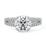 Round cut Cathedral Double claw set Moissanite lab grown diamond engagement ring with pave set V_split shank on a gold band, against a white background.Moissanite engagement ring cape town south africa grand diamonds ralph jacobs jeulia 