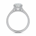 Round cut Cathedral Double claw set Moissanite lab grown diamond engagement ring with pave set V_split shank on a gold band, against a white background.Moissanite engagement ring cape town south africa grand diamonds ralph jacobs jeulia 