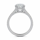 Round cut Cathedral Double claw set Moissanite lab grown diamond engagement ring with pave set V_split shank on a gold band, against a white background.Moissanite engagement ring cape town south africa grand diamonds ralph jacobs jeulia 